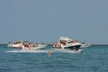 People Party On Boats Anchored In Lake Michigan