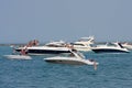 People Party On Boats Anchored On Lake Michigan