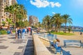 People on Paseo Maritimo promenade along Malagueta beach. Malaga. Andalusia, Spain Royalty Free Stock Photo