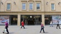 People Pass an Apple Store in Bath England