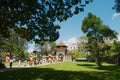 People pass entrance gate to the Temple of the Tooth Sri Dalada Maligawa in Kandy, Sri Lanka. Royalty Free Stock Photo