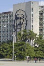 People pass iconic Ministry of Interior Defense building in Havana, Cuba.