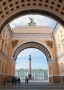 People pass under The Arch of The General Staff Building. St Petersburg. Russia Royalty Free Stock Photo