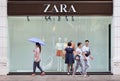 People pass a Zara outlet, Shanghai, China