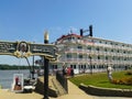 People and passenger alongside classical American Eagle river cruise boat berthed at Mark Twain Pier  Hannibal Missouri USA Royalty Free Stock Photo