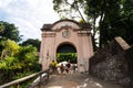 People passing through the entrance portal of Morro de Sao Paulo