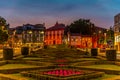 people passing over jardim do largo da Republica do Brasil square in Portuguese city Guimaraes