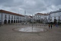 People passing on a street in Tavira, Algarve, in Portugal