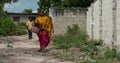 People passing by in Zanzibar village Royalty Free Stock Photo