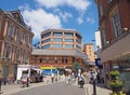 People in the pedestrian center of rochdale with the exchange shopping center on yorkshire street