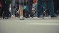 People pedestrians walks across a busy city street Royalty Free Stock Photo