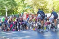 People perform a spinning session outdoors