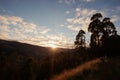 People photographing the sunrise over a mountain view in the Yarra Ranges, Victoria Australia