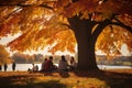 People picnic under the tree at park in autumn season. Generative AI