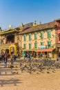 People and pigeons at the Boudha Stupa in Kathmandu