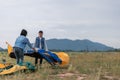 People Pitch a tent on the ground near the lake. Relaxing, traveling, long weeked, holiday concept Royalty Free Stock Photo