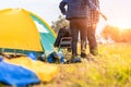 People Pitch a tent on the ground near the lake. Relaxing, traveling, long weeked, holiday concept Royalty Free Stock Photo