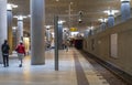 People at the platform at U-bahn Berlin Bundestag Metro Station in the Mitte district. Berlin, Germany.