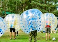 People play bumperball outdoor, Zorbsoccer Royalty Free Stock Photo