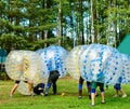 People play bumperball outdoor, Zorbsoccer Royalty Free Stock Photo