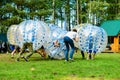 People play bumperball outdoor, Zorbsoccer Royalty Free Stock Photo