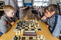 People play chess during chess competition in chess club. Education, chess and mind games. Competition and tournament. Royalty Free Stock Photo