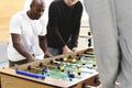 People Playing Enjoying Foosball Table Soccer Game Recreation Le Royalty Free Stock Photo