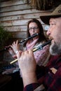 People playing flutes at an Irish Traditional Music session at a pub in Northern Ireland