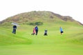 People playing golf on the golf links