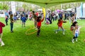 People playing with hula hoop in festival, London