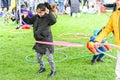 People playing with hula hoop in festival, London