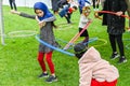 People playing with hula hoop in festival, London