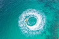 People are playing a jet ski in the sea. Aerial view and top view. Amazing nature background Royalty Free Stock Photo
