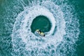 People are playing a jet ski in the sea.Aerial view. Top view.amazing nature background. The color of the water and beautifully Royalty Free Stock Photo