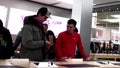 People playing new iwatch inside Apple store