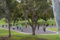 People playing pÃÂ©tanque, also called boules. It is winter, people playing at a public park wearing warm clothes. Group of aged Royalty Free Stock Photo