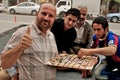 People playing traditional board game, Arbil, Autonomous Kurdistan, Iraq Royalty Free Stock Photo