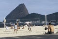 People playing volley-ball on a beach in Rio de Janeiro, Brazil. Royalty Free Stock Photo