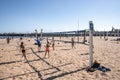 People playing volleyball at beach with Santa Cruz Wharf in the background Royalty Free Stock Photo