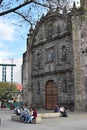 People on the plaza in front of the church of San Francisco de Asis in Guadalajara