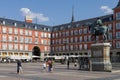 People at The Plaza Mayor Town square and the bronze statue of King Philip III. Madrid, Spain. Royalty Free Stock Photo