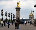 People on Pont Alexandre III bridge. Paris, France. Royalty Free Stock Photo