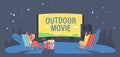 People with Pop Corn in Open Air Cinema at House Backyard or City Park. Characters Spend Night at Outdoor Movie Theater