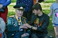 People pose for photos on Victory day. Gorky park in Moscow