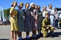 People pose for photos on Victory day. Gorky park in Moscow