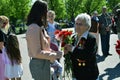 People pose for photos on Victory day. Gorky park in Moscow