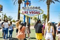 People pose at scenic historic famous Las Vegas welcome sign