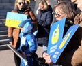 People with posters waiting for the peace protest to start