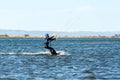 People practicing kite Surfing in Platja del Trabucador in the Delta del Ebro, Tarragona, Spain in summer 2020