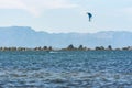 People practicing kite Surfing in Platja del Trabucador in the Delta del Ebro, Tarragona, Spain in summer 2020